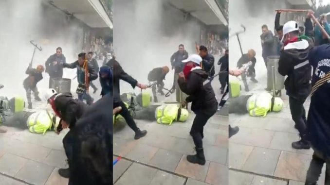 Golpiza a un policía en Bogotá.