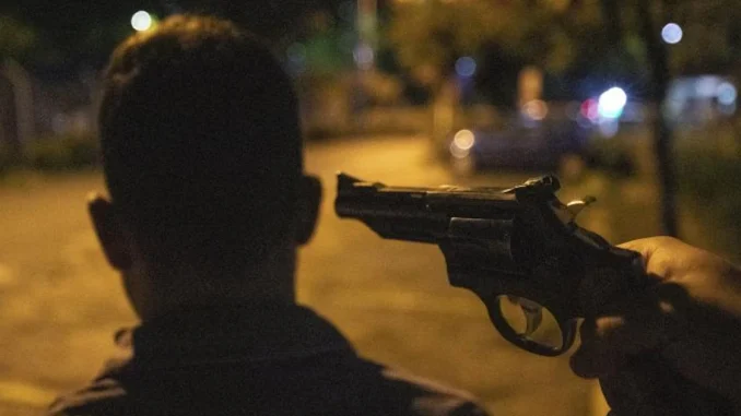 asesinato con arma de fuego