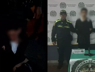 Uno de los hombres que intentaba robar la licorería fue atrapado y golpeado por la comunidad.
