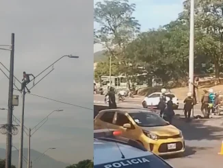 El hombre permaneció en lo alto del poste cerca a la Terminal del Norte por poco más de media hora.